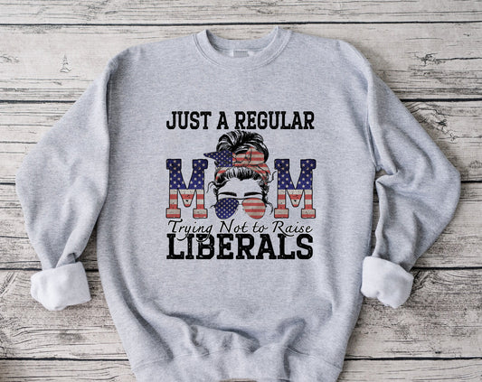 Just a regular mom trying not to raise liberals sweatshirt