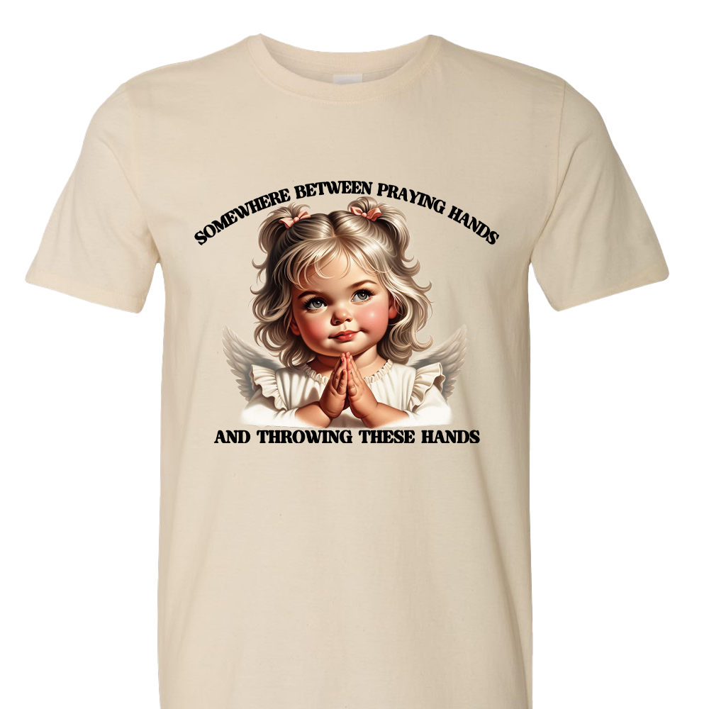 Somewhere Between Praying Hands and Throwing Hands Funny T-Shirt
