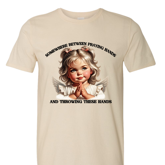 Somewhere Between Praying Hands and Throwing Hands Funny T-Shirt